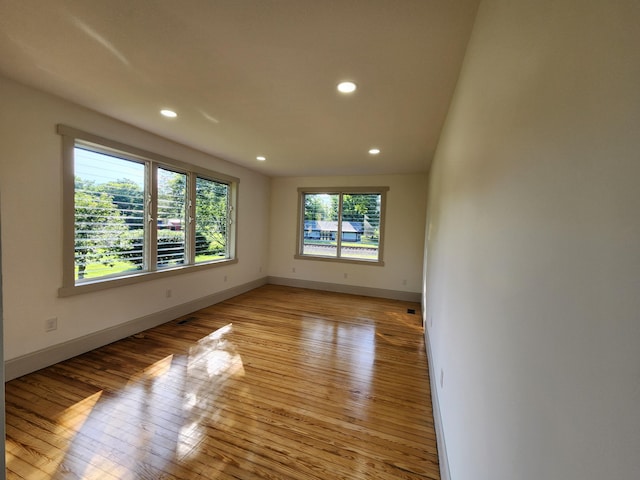 1 Magnolia St, Niota, TN 37826 - empty room featuring light wood-style floors and recessed lighting