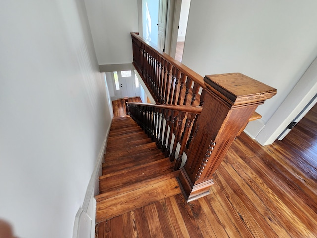 1 Magnolia St, Niota, TN 37826 - stairway with hardwood / wood-style flooring and a towering ceiling