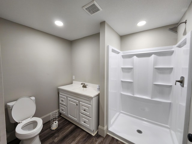 1 Magnolia St, Niota, TN 37826 - bathroom with vanity, a shower, wood finished floors, and recessed lighting