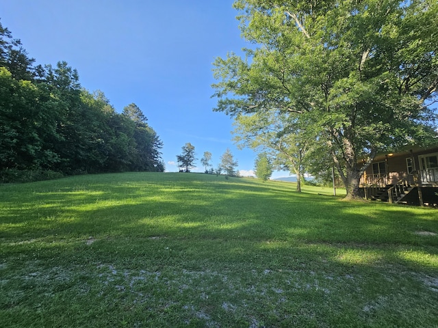 770 Jack Smith Rd Unit 15, Dunlap, TN 37327 - view of green lawn with stairs and a wooden deck