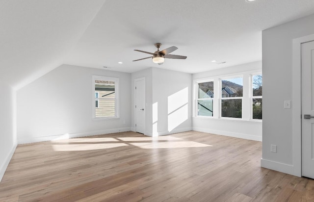 10541 E Brainerd Rd, Apison, TN 37302 - additional living space with light wood finished floors, ceiling fan, recessed lighting, and vaulted ceiling