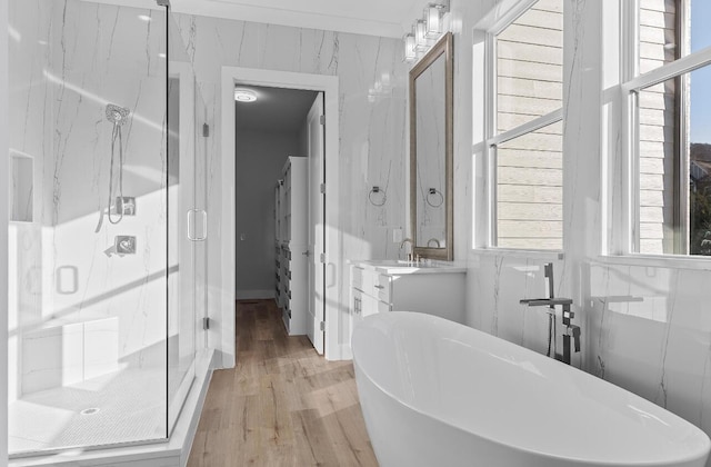 10541 E Brainerd Rd, Apison, TN 37302 - full bath featuring a marble finish shower, a freestanding tub, wood finished floors, and vanity