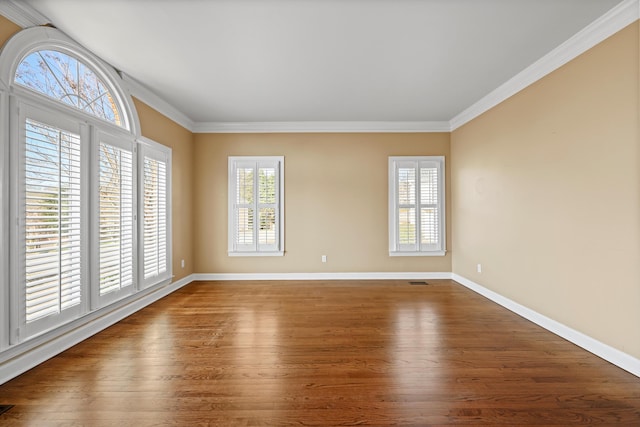 6401 Beacon Pointe Cir, Hixson, TN 37343 - unfurnished room featuring plenty of natural light, wood finished floors, and crown molding