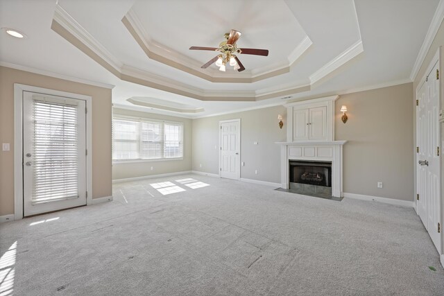 6401 Beacon Pointe Cir, Hixson, TN 37343 - unfurnished living room with ceiling fan, a raised ceiling, crown molding, a large fireplace, and carpet flooring