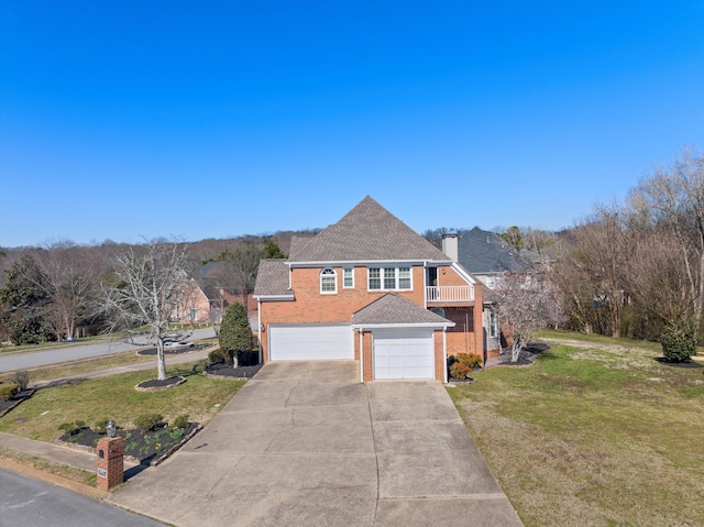 6401 Beacon Pointe Cir, Hixson, TN 37343 - view of front of house with brick siding, driveway, a front yard, a shingled roof, and an attached garage