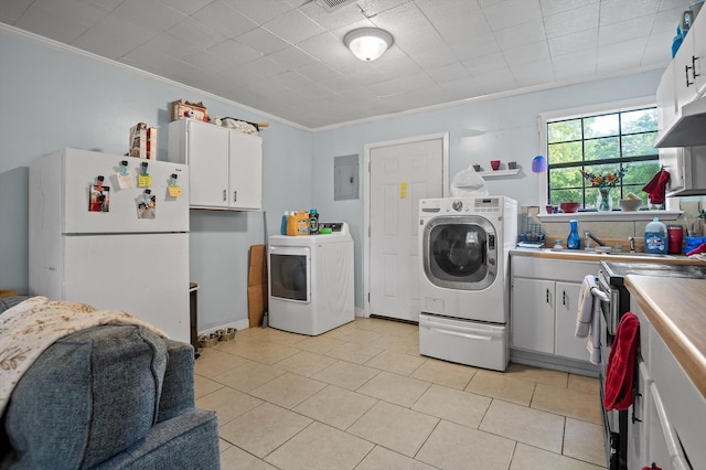 1618 E State Line Rd, Rossville, GA 30741 - washroom featuring washer and clothes dryer, crown molding, electric panel, and light tile patterned flooring