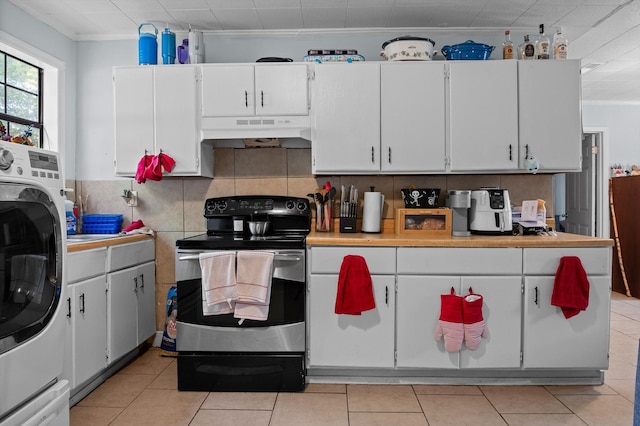 1618 E State Line Rd, Rossville, GA 30741 - kitchen with washer / clothes dryer, stainless steel range with electric cooktop, under cabinet range hood, ornamental molding, and light countertops
