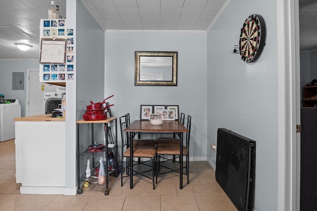 1618 E State Line Rd, Rossville, GA 30741 - tiled dining room with ornamental molding, electric panel, and washer and clothes dryer