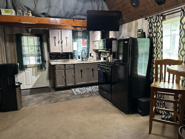 365 Green Dr Unit 4, Pikeville, TN 37367 - kitchen with black appliances, gray cabinets, plenty of natural light, and light countertops