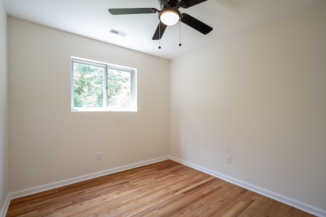137 N Hidden Valley Rd, Rossville, GA 30741 - empty room with light wood-style floors and a ceiling fan