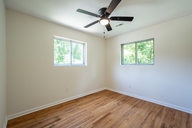 137 N Hidden Valley Rd, Rossville, GA 30741 - unfurnished room with light wood finished floors and a ceiling fan