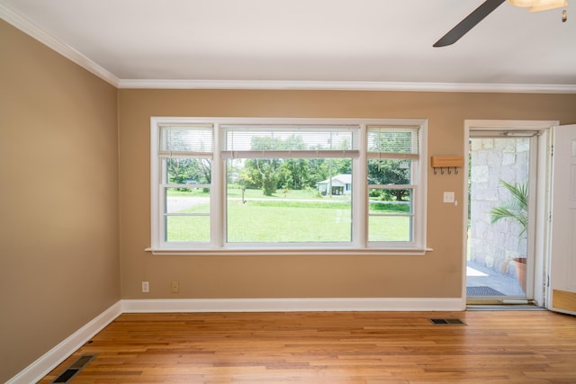 208 Wilder Rd, Chickamauga, GA 30707 - empty room with ceiling fan, light wood-style flooring, plenty of natural light, and ornamental molding