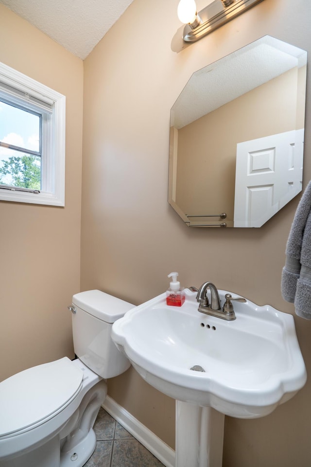 208 Wilder Rd, Chickamauga, GA 30707 - bathroom with toilet and tile patterned floors
