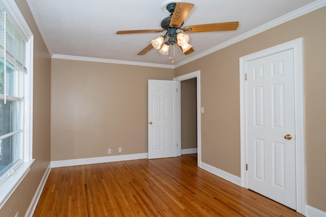 208 Wilder Rd, Chickamauga, GA 30707 - unfurnished bedroom with wood finished floors, crown molding, and ceiling fan