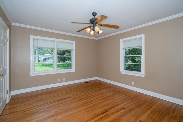 208 Wilder Rd, Chickamauga, GA 30707 - spare room featuring healthy amount of natural light, light wood-type flooring, crown molding, and ceiling fan