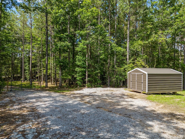 1780 Wolf Haven Rd, Spencer, TN 38585 - view of yard with a shed and a forest view