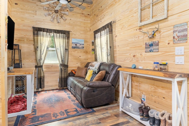 1780 Wolf Haven Rd, Spencer, TN 38585 - sitting room featuring ceiling fan, wooden walls, and wood finished floors