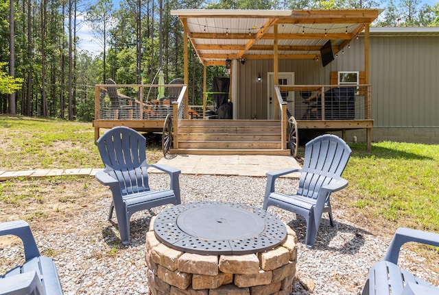 1780 Wolf Haven Rd, Spencer, TN 38585 - view of patio with an outdoor fire pit and a deck