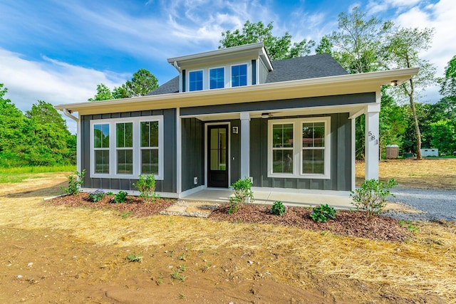 581 W Reed Rd, Lafayette, GA 30728 - view of front facade with covered porch, board and batten siding, and roof with shingles