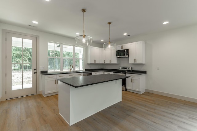581 W Reed Rd, Lafayette, GA 30728 - kitchen featuring stainless steel appliances, dark countertops, white cabinets, and recessed lighting