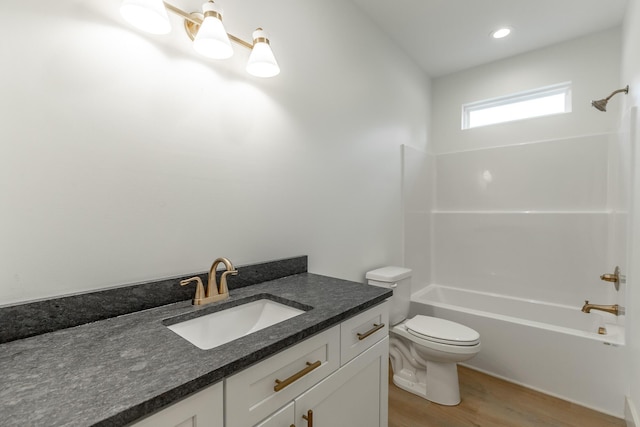 581 W Reed Rd, Lafayette, GA 30728 - bathroom with  shower combination, vanity, and wood finished floors