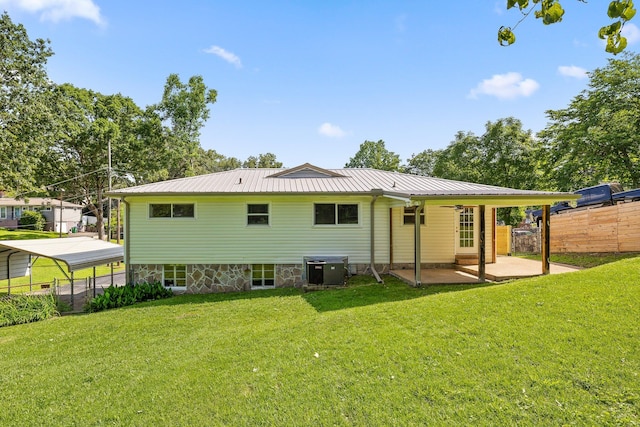 3712 Norma Dr, Chattanooga, TN 37412 - back of house with a detached carport, a patio, and a metal roof