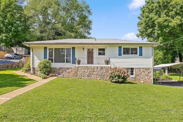 3712 Norma Dr, Chattanooga, TN 37412 - ranch-style home with a carport, a front lawn, a metal roof, and stone siding