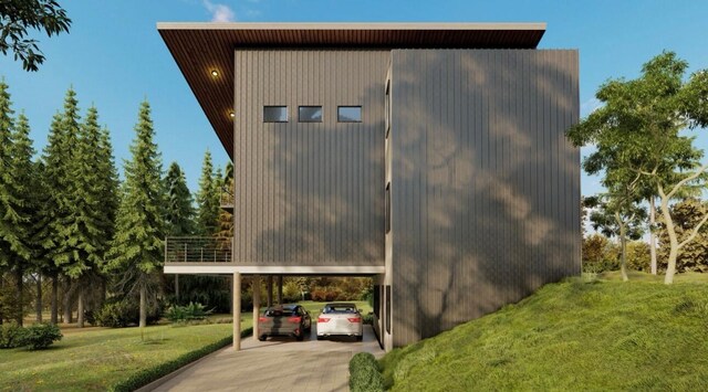 542 Cave Ln, Hixson, TN 37343 - view of side of home with a lawn, a carport, and concrete driveway