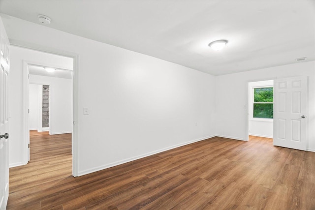 1320 Coker Dr, Dalton, GA 30721 - unfurnished room featuring a smoke detector and wood finished floors