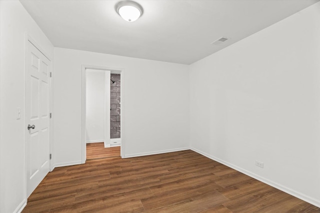 1320 Coker Dr, Dalton, GA 30721 - unfurnished bedroom featuring wood finished floors and baseboards