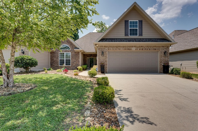 2742 Amsterdam Ln Unit 14, Chattanooga, TN 37421 - traditional-style home with brick siding, concrete driveway, a front lawn, and roof with shingles