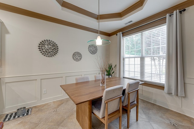2742 Amsterdam Ln Unit 14, Chattanooga, TN 37421 - dining area with ornamental molding, a decorative wall, a raised ceiling, and wainscoting