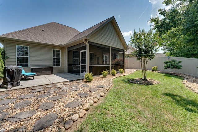 2742 Amsterdam Ln Unit 14, Chattanooga, TN 37421 - rear view of house featuring a sunroom, a fenced backyard, a patio, and a shingled roof