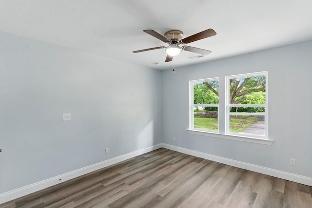2207 Spencer Ave, Chattanooga, TN 37421 - spare room featuring wood finished floors and ceiling fan
