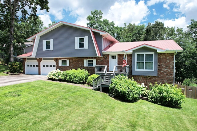 7211 Fairington Cir, Hixson, TN 37343 - split level home with brick siding, a garage, concrete driveway, a gambrel roof, and a metal roof