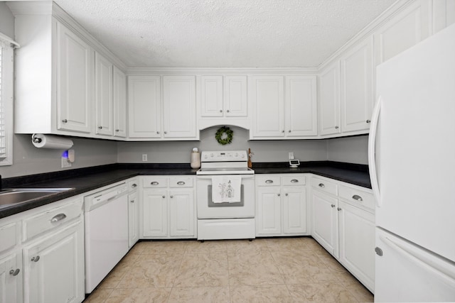 119 Broadacre Rd NE, Dalton, GA 30721 - kitchen with white appliances, white cabinets, dark countertops, and a textured ceiling