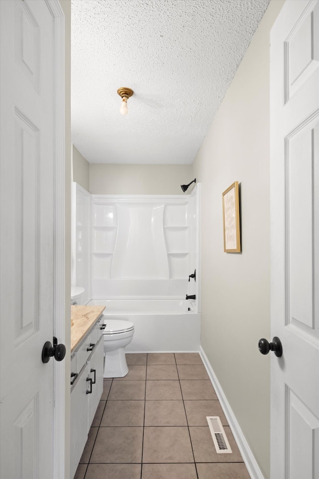 119 Broadacre Rd NE, Dalton, GA 30721 - full bathroom featuring vanity, tile patterned floors, a textured ceiling, and bathing tub / shower combination