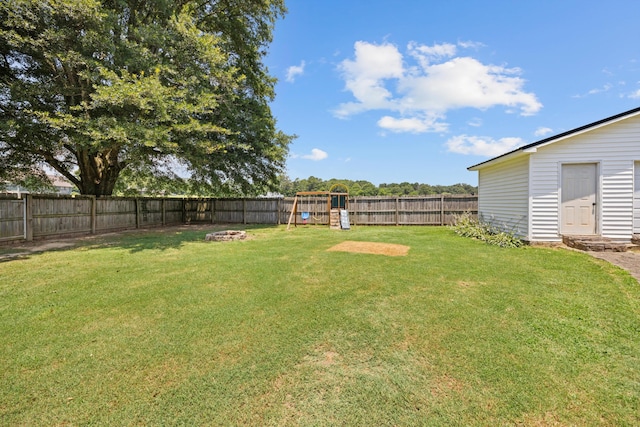 119 Broadacre Rd NE, Dalton, GA 30721 - fenced backyard featuring a playground