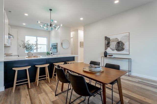 1857 Zeta Way, Chattanooga, TN 37404 - dining room featuring light wood-style flooring, recessed lighting, and a chandelier