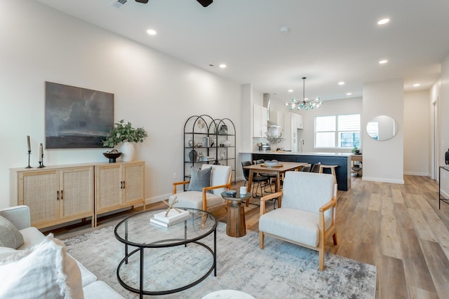 1857 Zeta Way, Chattanooga, TN 37404 - living area featuring recessed lighting, light wood-type flooring, a chandelier, and a ceiling fan