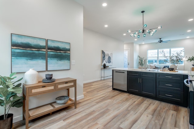 1857 Zeta Way, Chattanooga, TN 37404 - kitchen featuring dishwasher, light countertops, light wood-style floors, recessed lighting, and a chandelier
