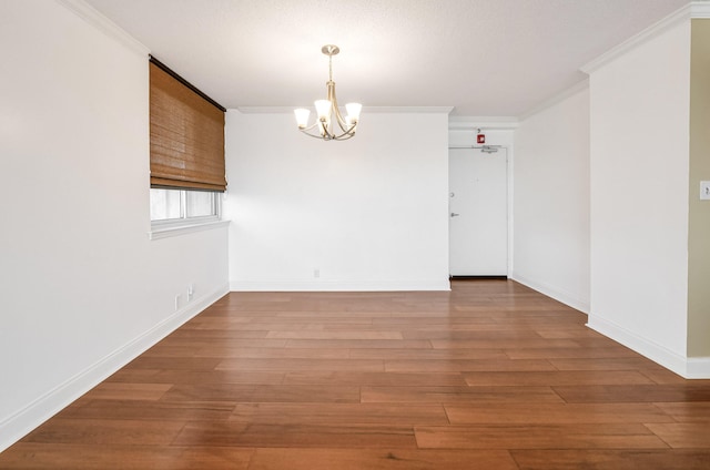 1131 Stringers Ridge Rd Unit 4C, Chattanooga, TN 37405 - unfurnished room with a chandelier, ornamental molding, and wood finished floors