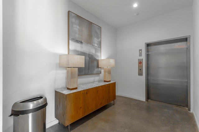 411 Fairpoint St Unit 308, Chattanooga, TN 37405 - hall featuring elevator, finished concrete flooring, and recessed lighting