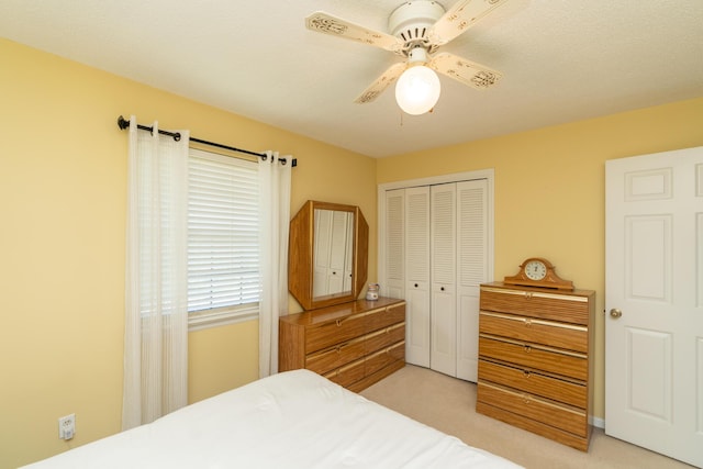 1510 Cannon Dr, Fort Oglethorpe, GA 30742 - bedroom featuring a closet, light carpet, and ceiling fan