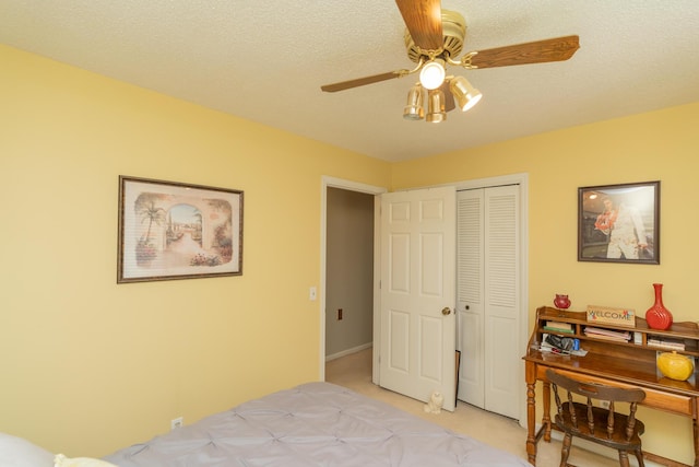 1510 Cannon Dr, Fort Oglethorpe, GA 30742 - bedroom with a closet, light colored carpet, and a ceiling fan