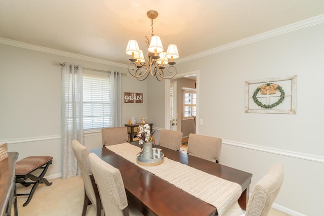 1510 Cannon Dr, Fort Oglethorpe, GA 30742 - dining room featuring a chandelier, light carpet, and ornamental molding