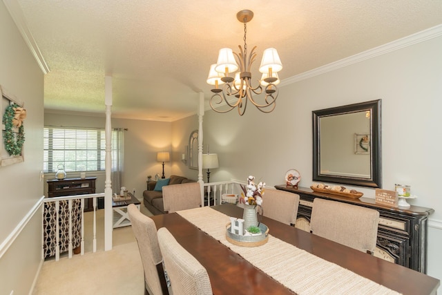 1510 Cannon Dr, Fort Oglethorpe, GA 30742 - dining space featuring ornamental molding, carpet flooring, a chandelier, and a textured ceiling