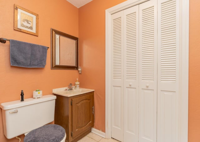1510 Cannon Dr, Fort Oglethorpe, GA 30742 - bathroom featuring a closet, vanity, and tile patterned flooring