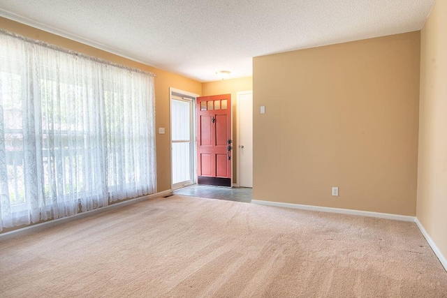 505 Heidi Cir, Chattanooga, TN 37415 - carpeted spare room with a textured ceiling and baseboards