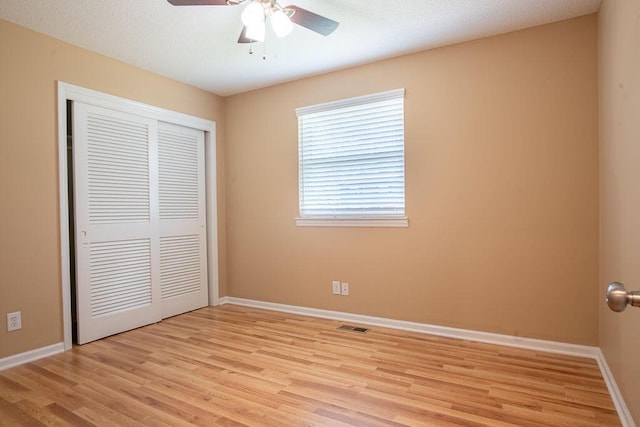 505 Heidi Cir, Chattanooga, TN 37415 - unfurnished bedroom featuring light wood-type flooring, a closet, and a ceiling fan